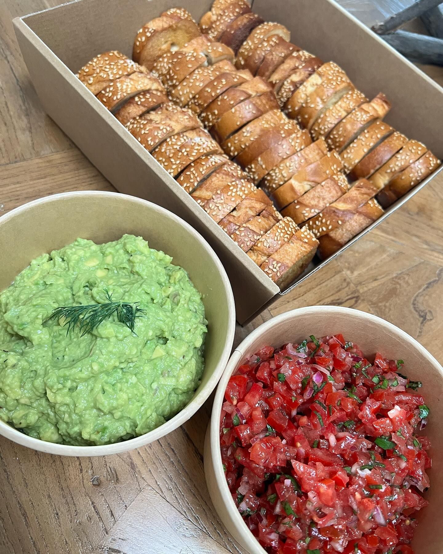 A Bunch of Bowls of Food Are Sitting on a Table — Coastal Catering in North Avoca, NSW