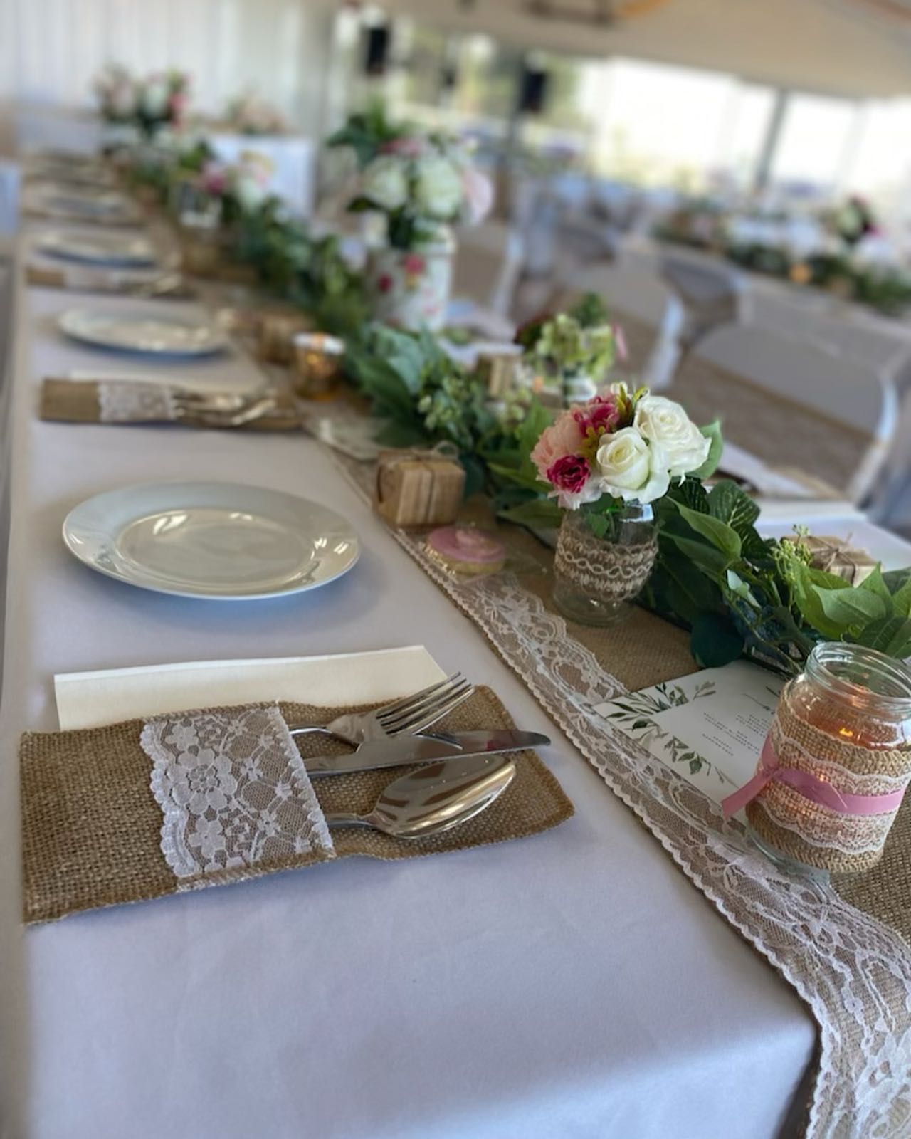 A Table With a White Table Cloth and Silverware on It — Coastal Catering in North Avoca, NSW
