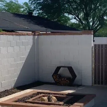 Wrought iron gate supported by brick pillars in Arizona