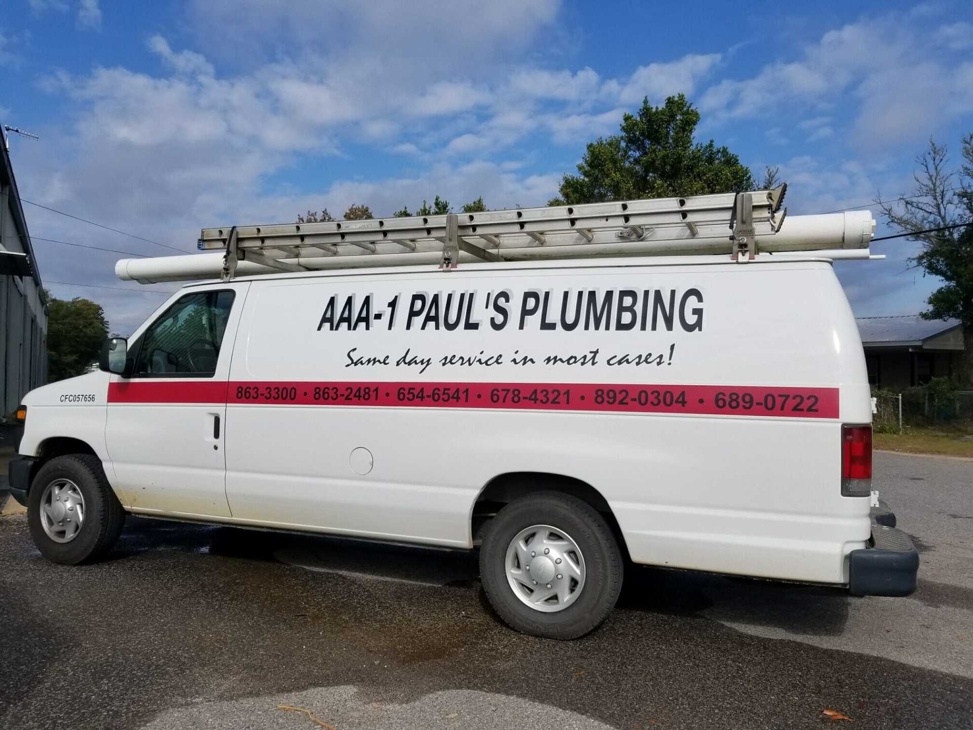 Workers In Family Business Standing Next To Van — Plumbing and Piping Fixed and Installed in Fort Walton Beach,FL