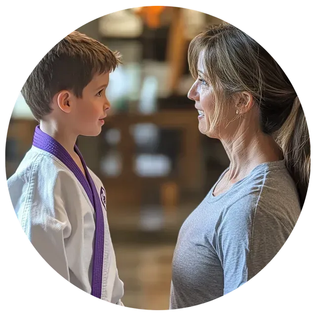 A woman and a young boy are looking at each other in a circle.