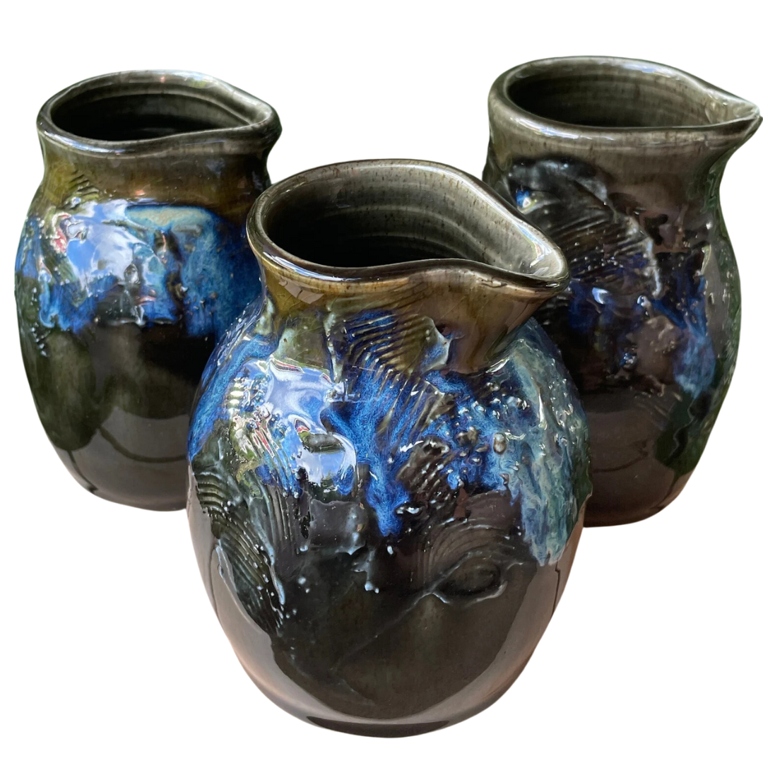 blue and white ceramic creamer jars for coffee and brunch gatherings