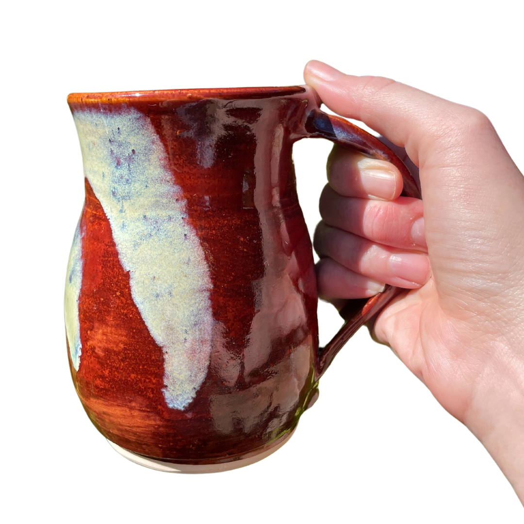 red ceramic handmade mug from Kailua Potters, LLC based in Kailua, Oahu