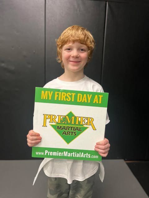 An aerial view of a city skyline at sunset.