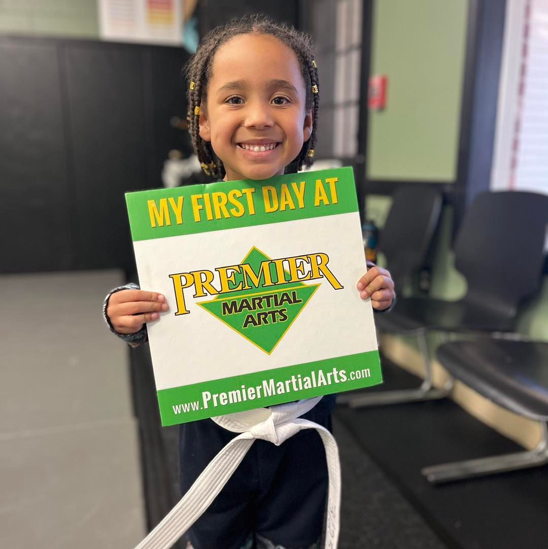 An aerial view of a city skyline at sunset.