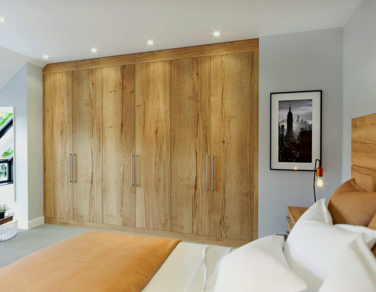Large wooden wardrobe in a bedroom with a bed and a framed picture on the wall.