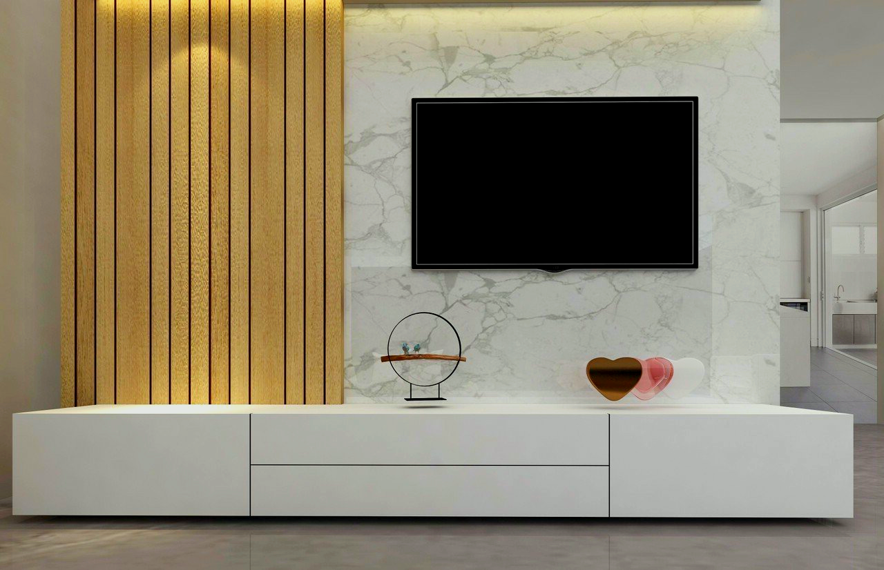 Modern living room with a mounted TV, white cabinet, marble wall, and wooden paneling.  Decorations include glass sculptures.