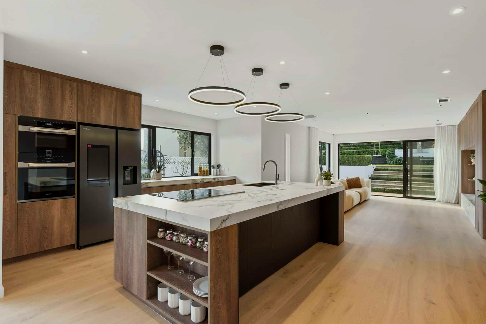 There is a large island in the middle of the kitchen.