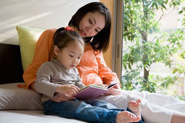 Egg Donation — Mother Teaching her Child to Read in Colorado Springs, CO