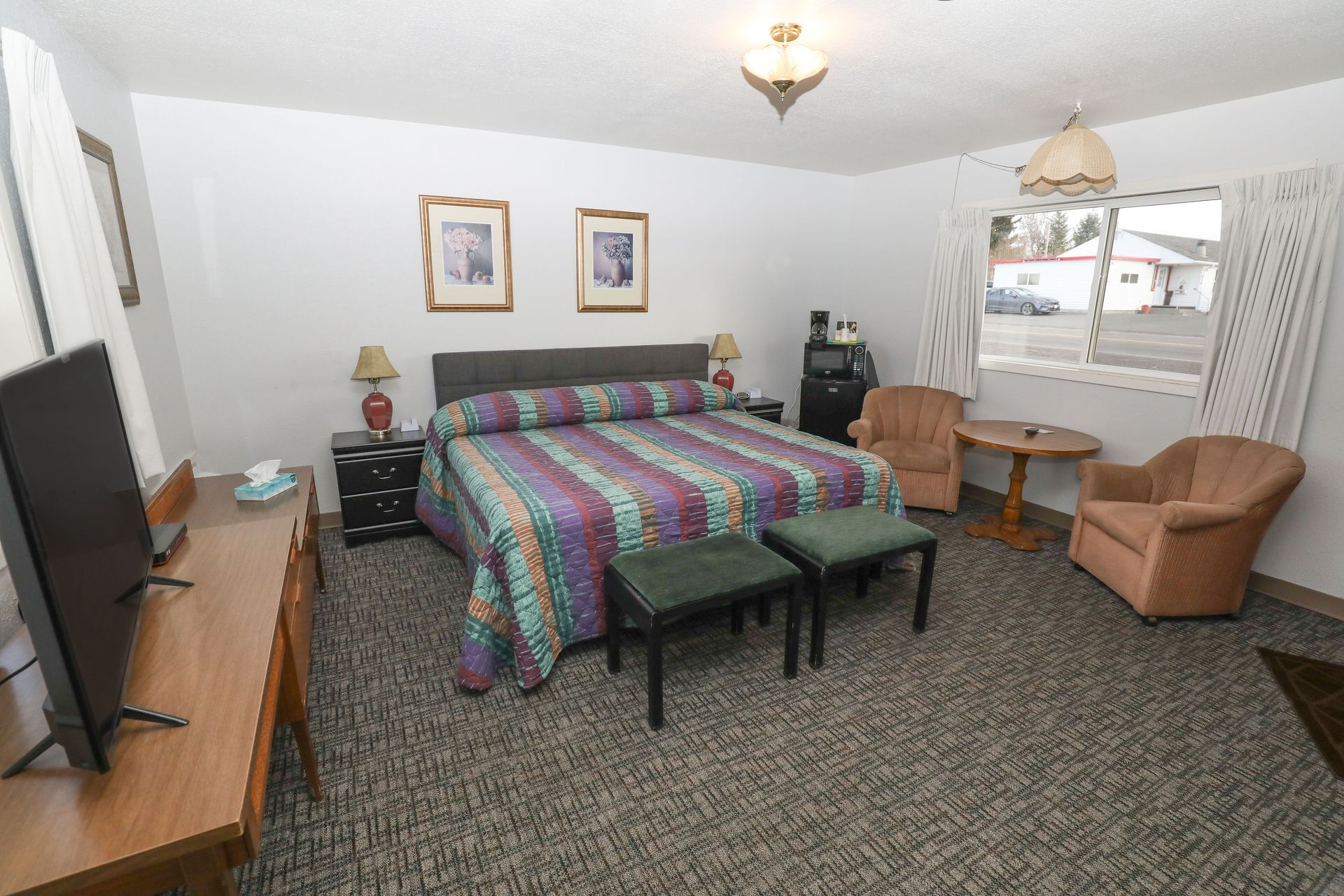 There is a large bed in the middle of the room.