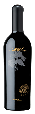 A black bottle of Lucill wine featuring a silver grape leaf graphic, gold lettering, and a round emblem on the label.