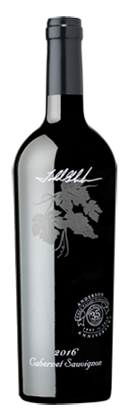 A black wine bottle with a grape leaf illustration, the year 2016, and the label text Cabernet Sauvignon.