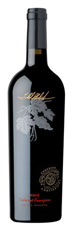 A dark wine bottle with a gold logo and leaf graphic, labeled as 2018 Cabernet Sauvignon from Napa Valley.