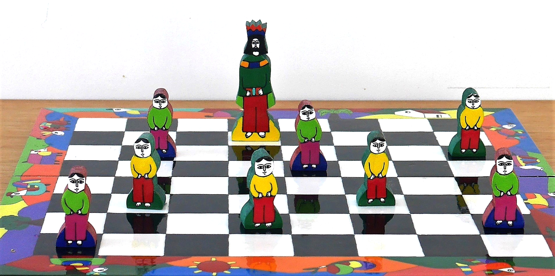 chessboard with king behind pawns