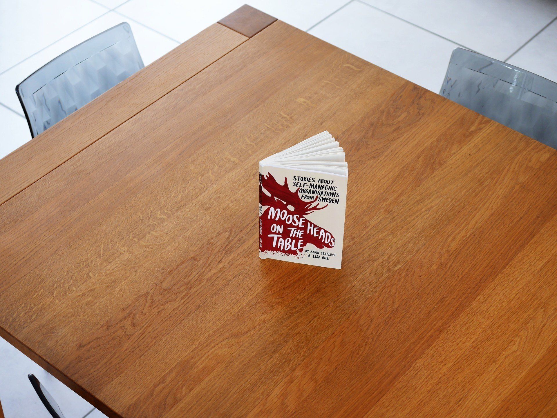 A book on a brown table