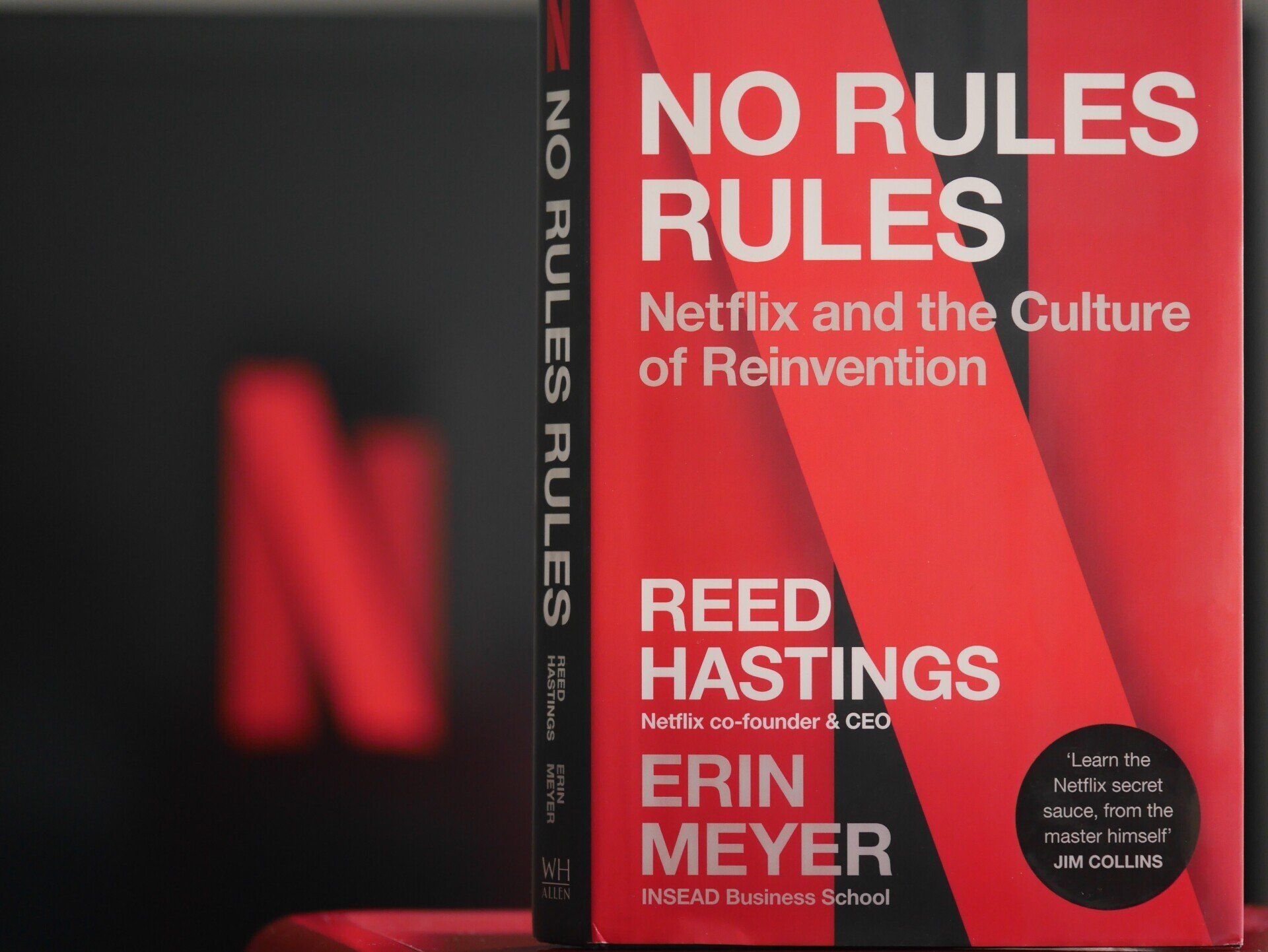 Front of a red book, entitled No Rules Rules, with the Netflix logo in the background