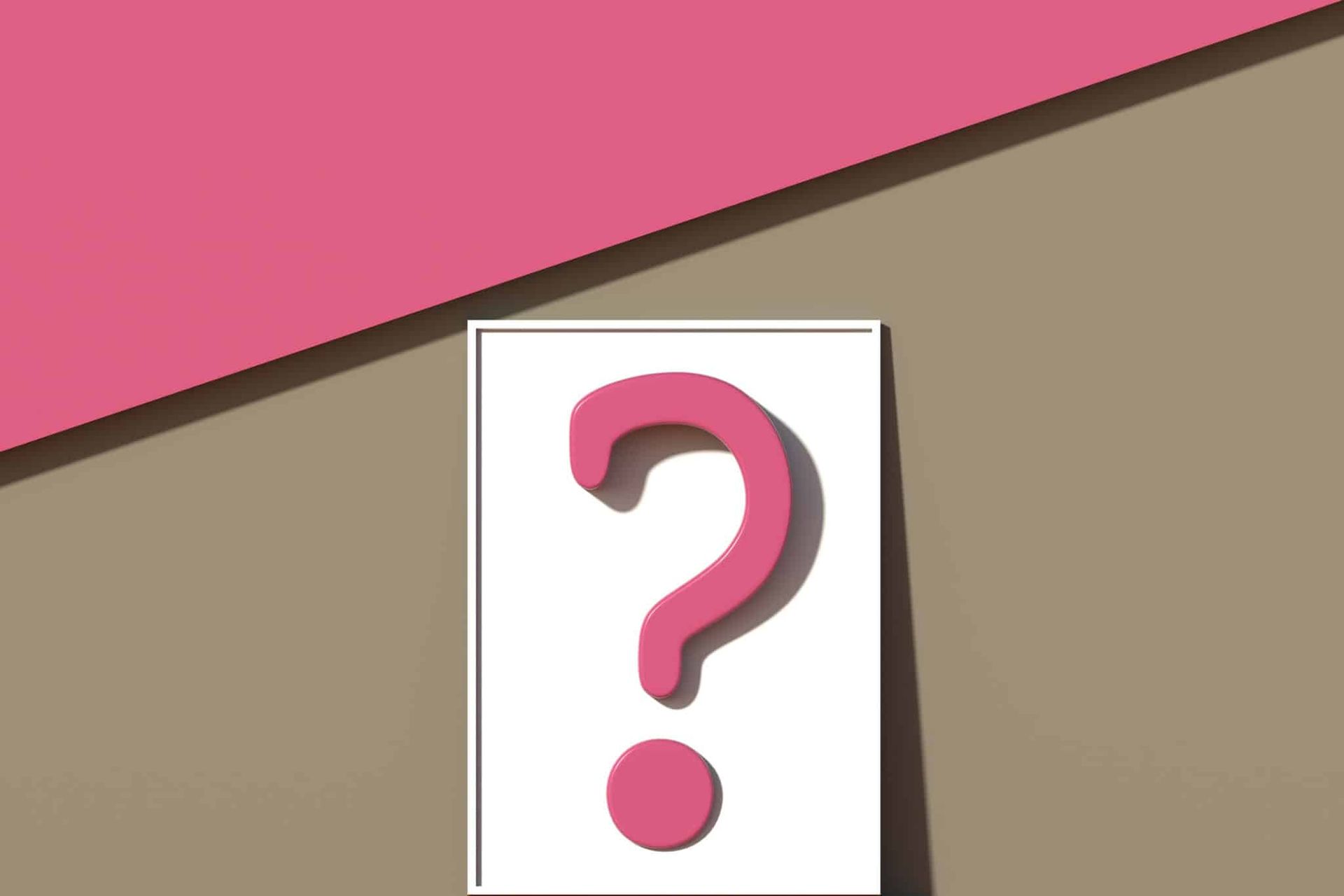 Pink question mark inside a white frame on a tan background, with a pink shape in the upper left corner.