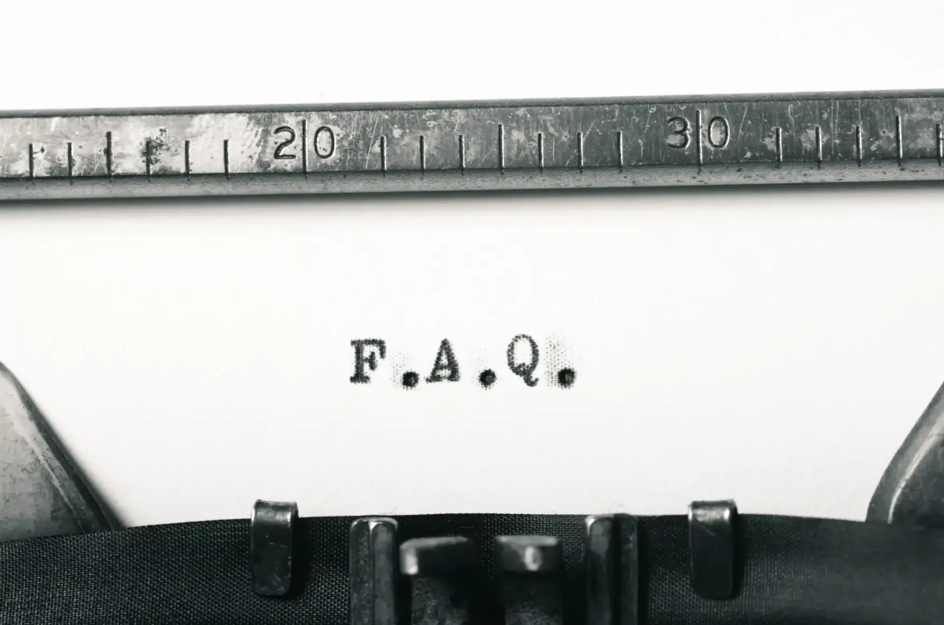 F.A.Q. typed on a vintage typewriter.