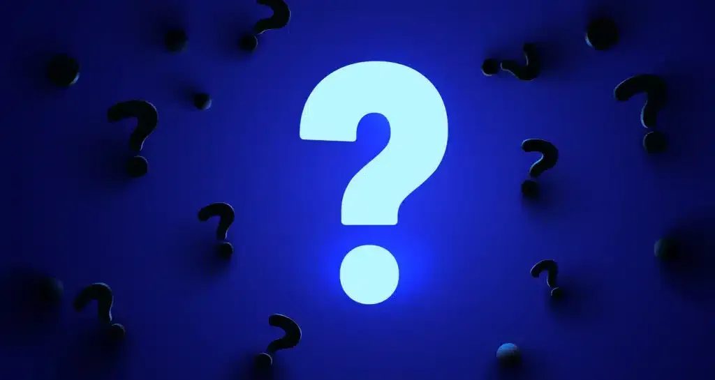 Glowing question mark surrounded by smaller, dark question marks on a blue background.
