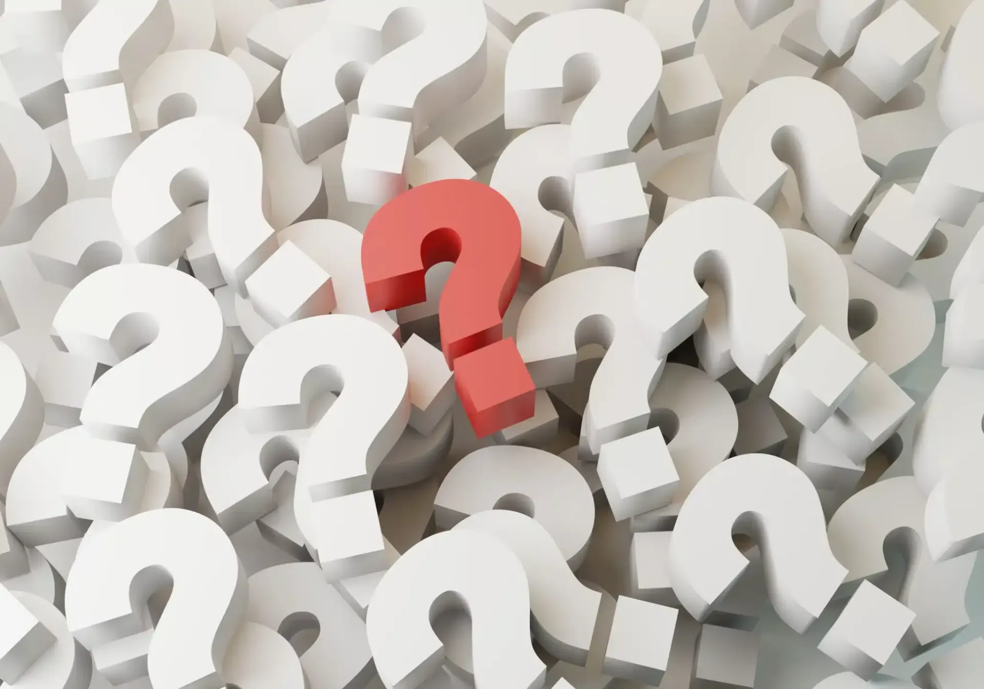 Red question mark among white question marks.