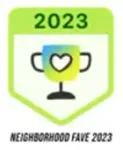 Neighborhood Fave 2023 badge with a trophy icon and heart, set within a green and white design.