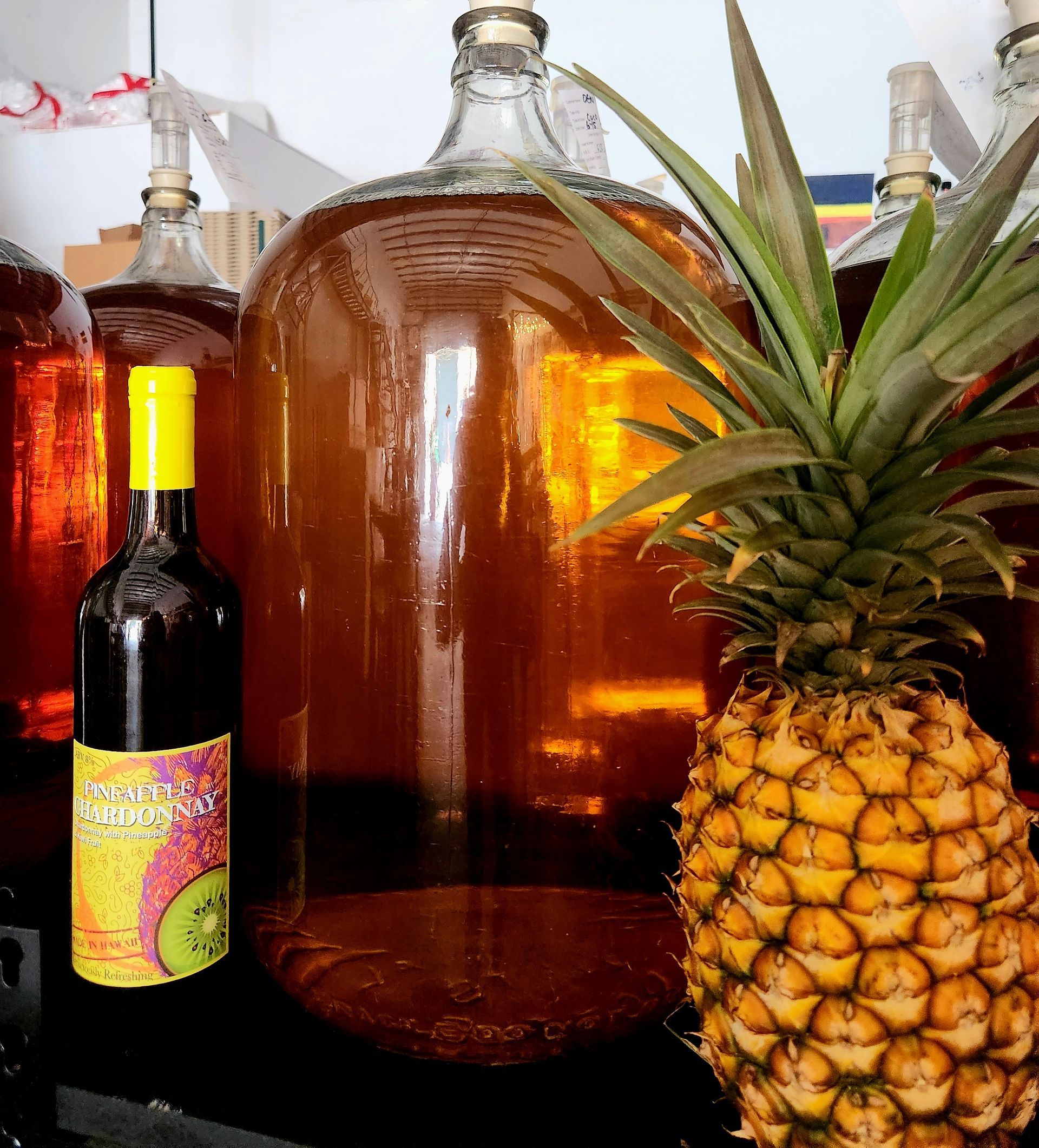 A Pineapple And Bottle Of Wine | Kailua, HI | Oeno Winemaking