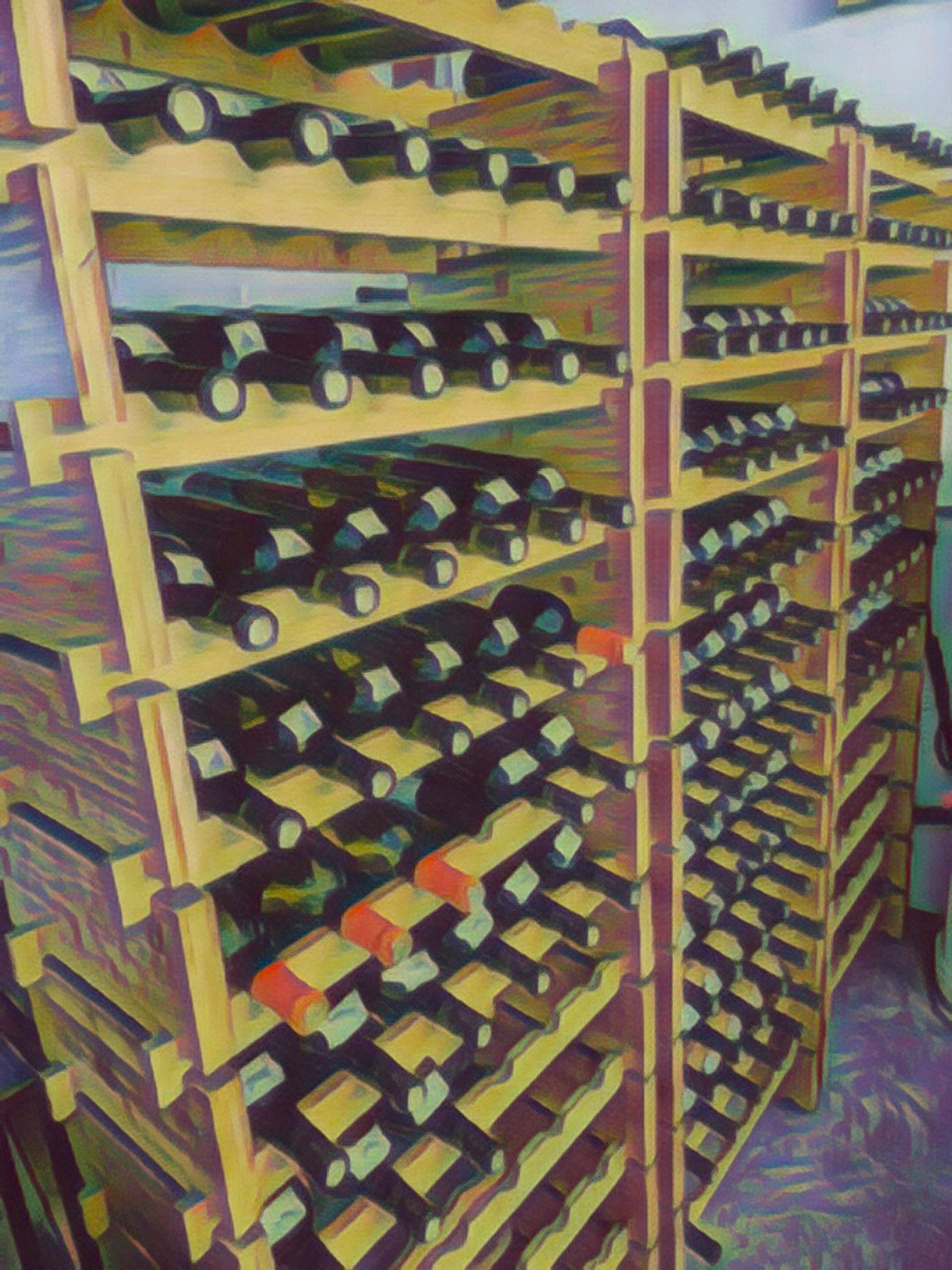 Stacked Of Wine On Wooden Shelves | Kailua, HI | Oeno Winemaking