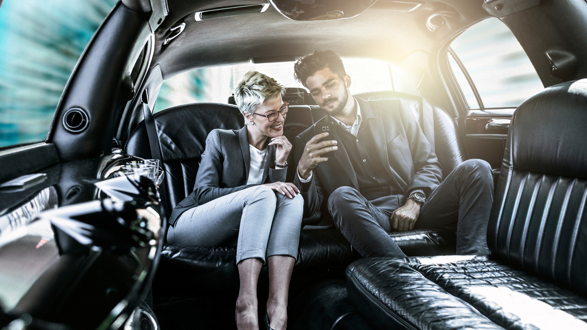 Business People Talking Inside the Car