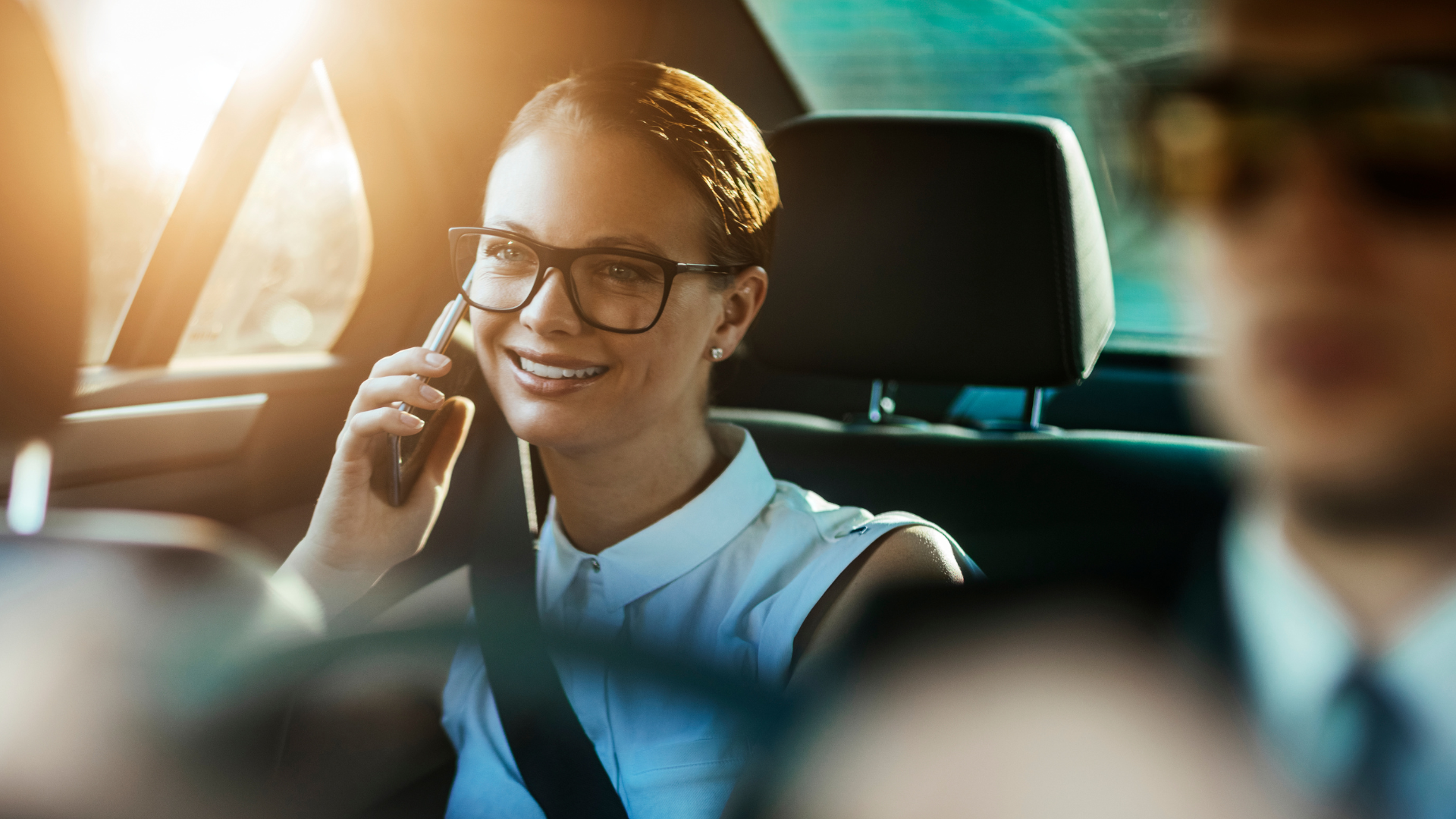 Woman Making a Phone Call Inside the Car