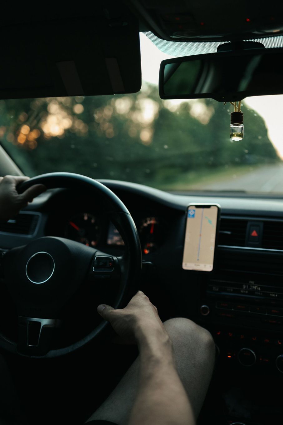 Man Driving a Car