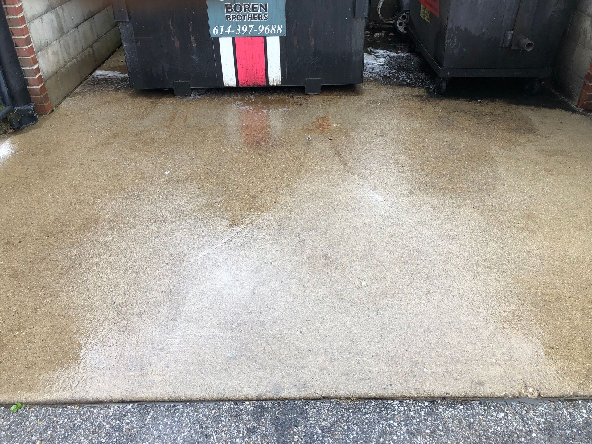 Clean power washed dumpster pad — Dublin, OH — Elite Softwash
