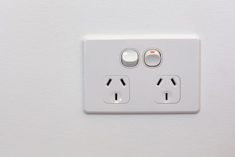 White Wall-mounted Electrical Outlet With Two Sockets and Two Light Switches  — Holders Electrical In Tenterfield, NSW 