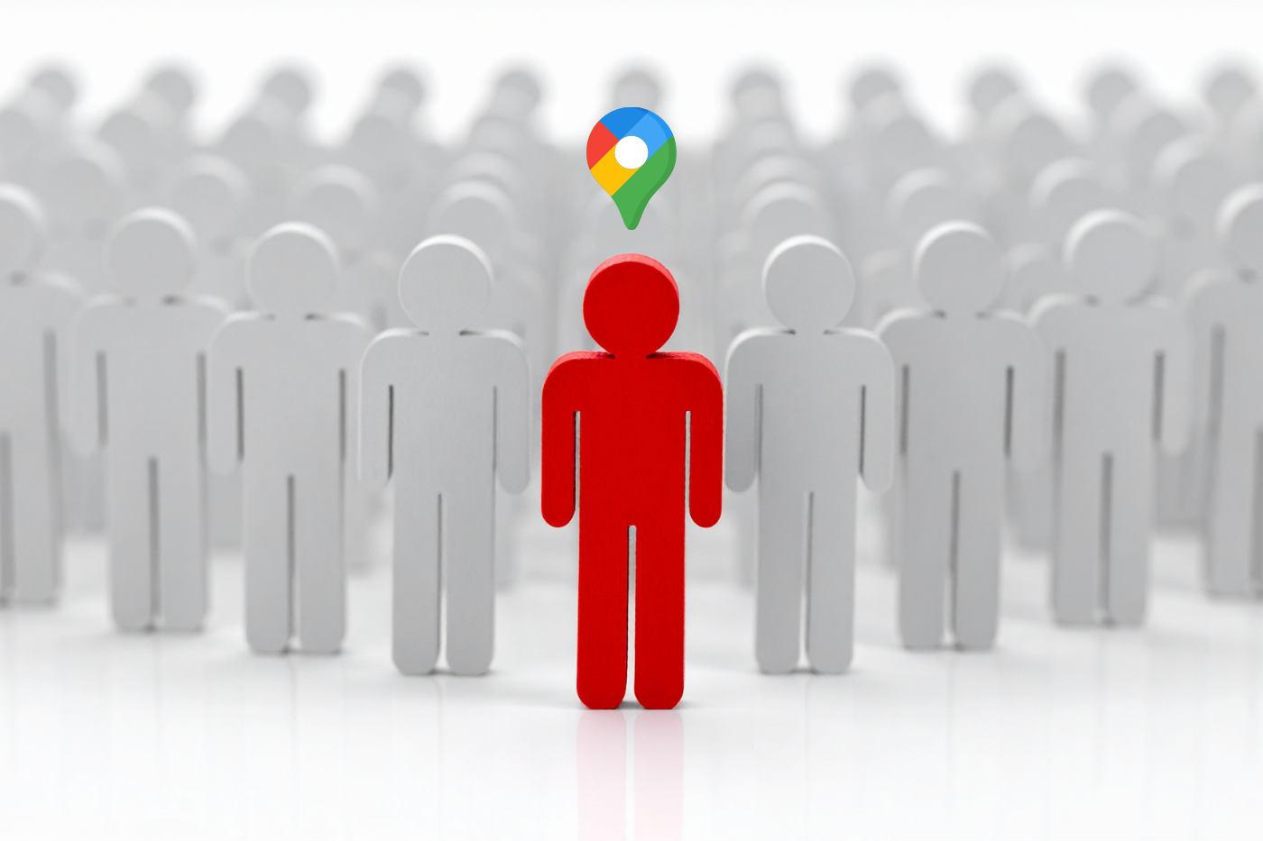 Red figure with Google Maps pin, in front of a crowd of gray figures.
