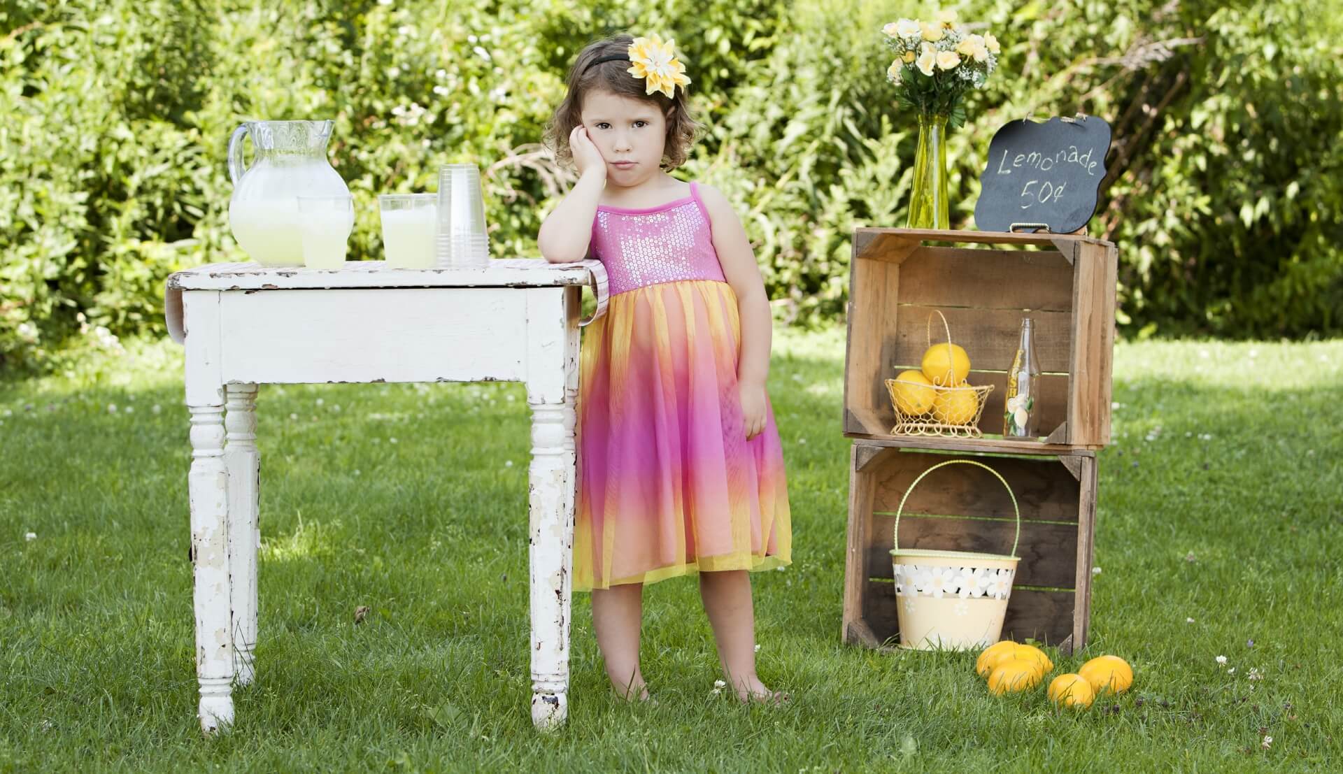a child selling lemonade