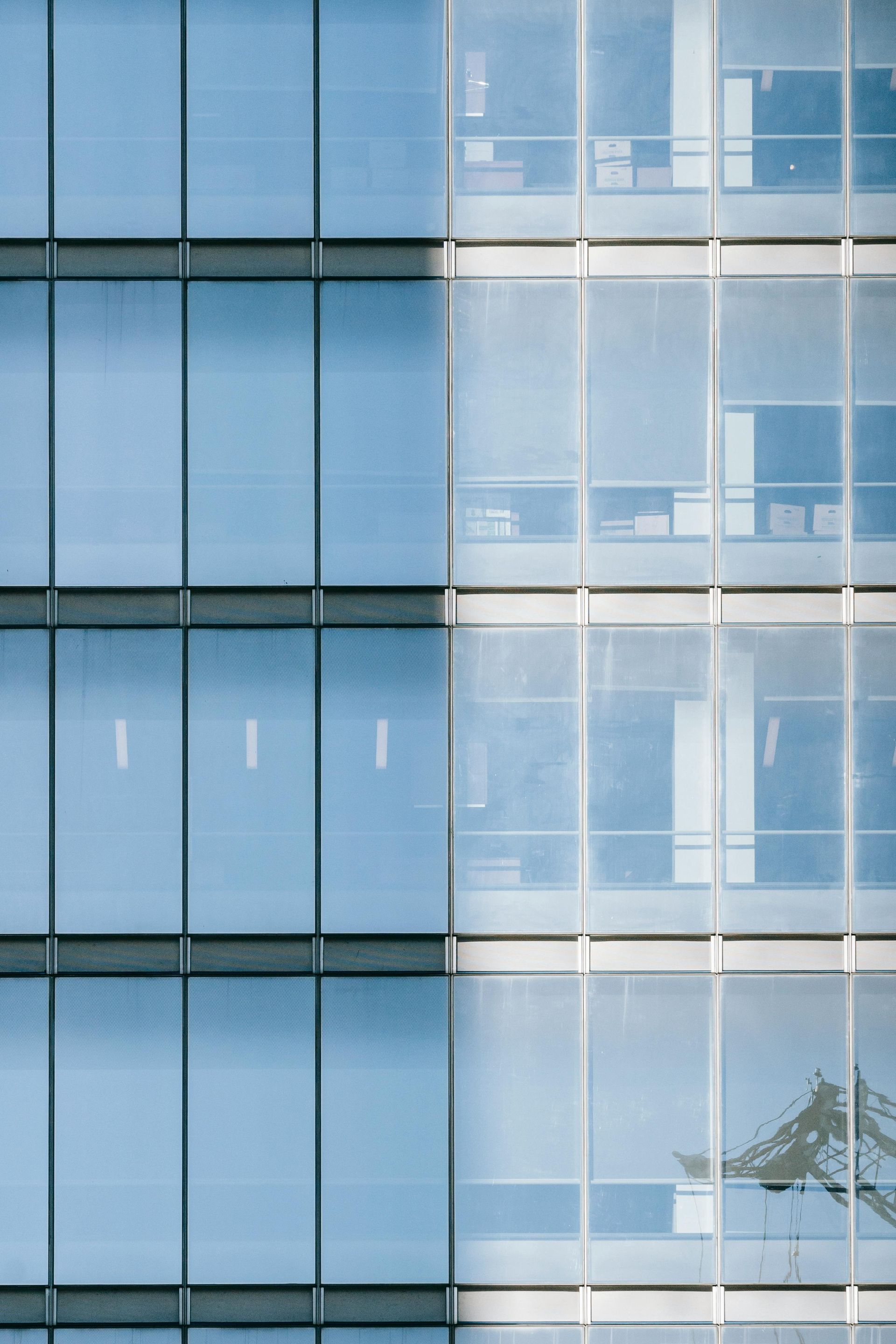 A close up of a building with a lot of windows.