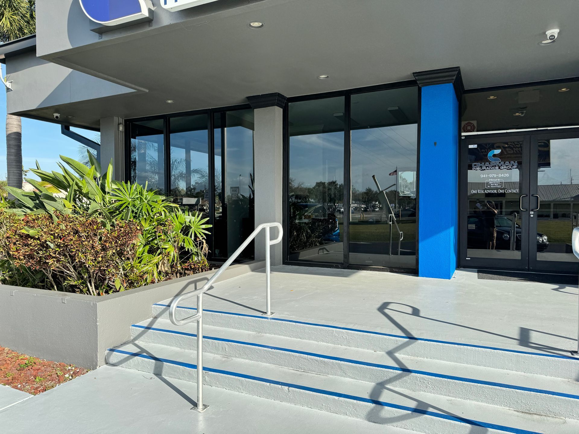 The front of a building with stairs leading up to it