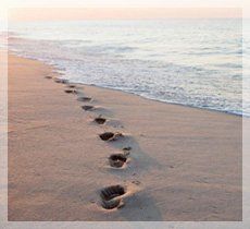 beach with footprints in sand