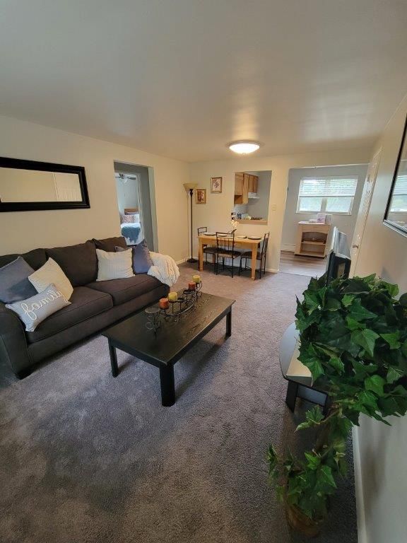 A living room with a couch and a coffee table