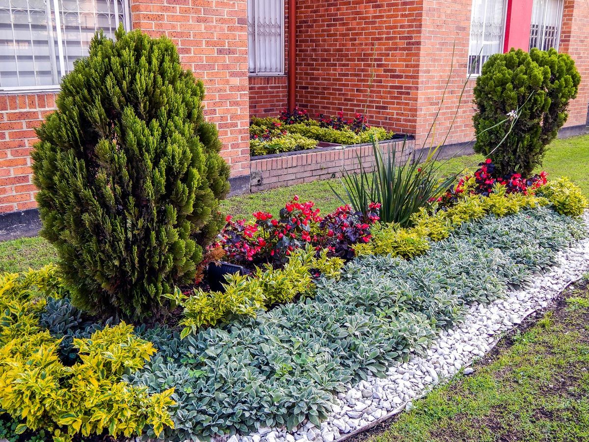Garden With Bushes And Flowers — Decatur, TX — Superior Lawn & Landscape