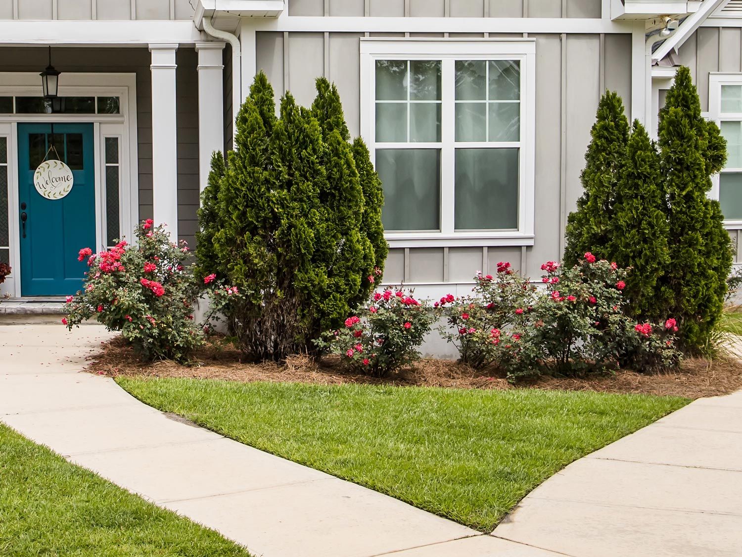 House Landscape With Flowers — Decatur, TX — Superior Lawn & Landscape