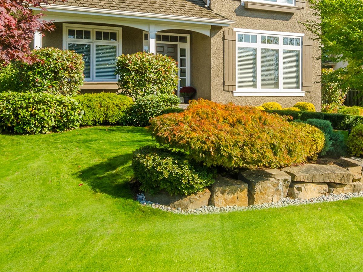 House Landscape With Bushes — Decatur, TX — Superior Lawn & Landscape