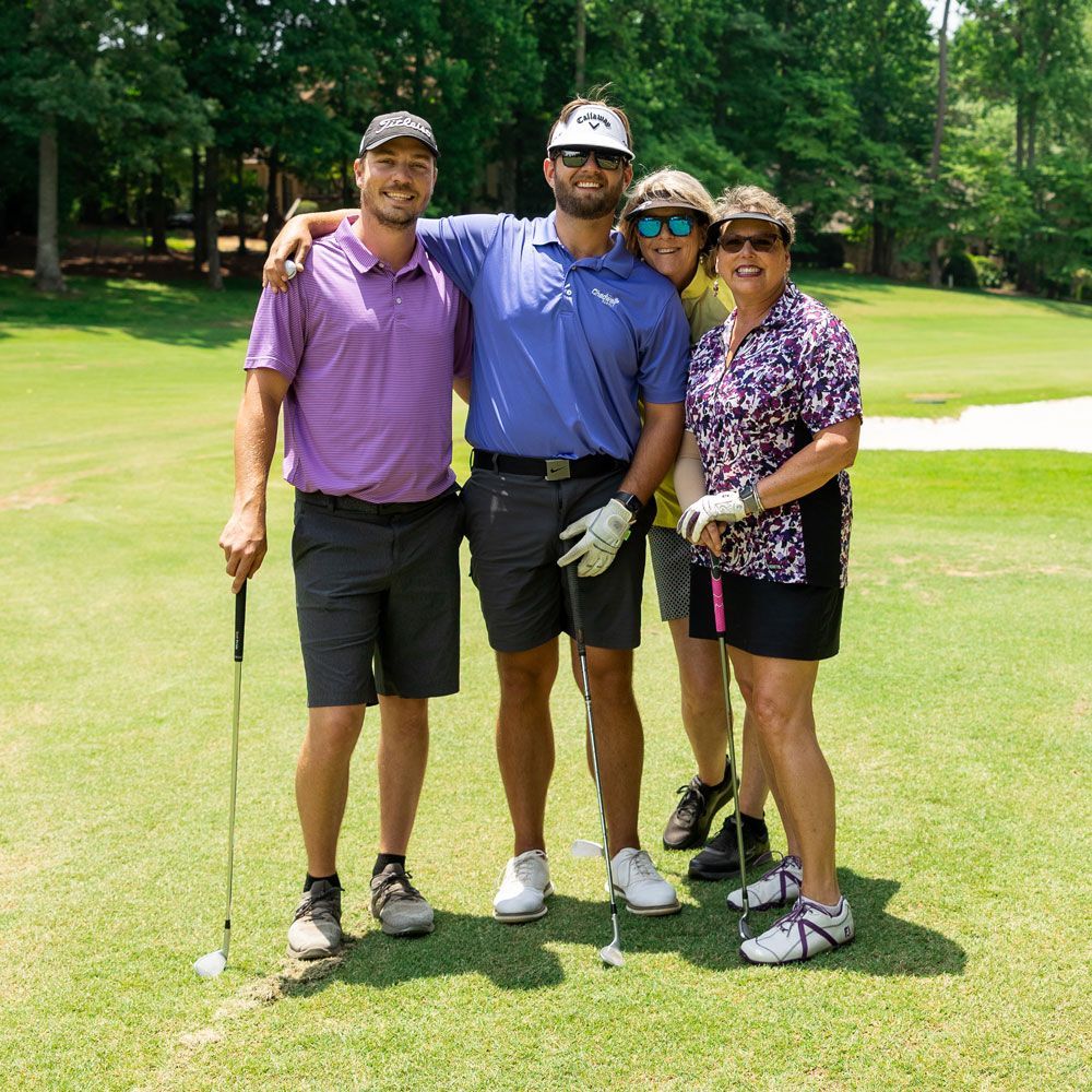 People Taking a Photo on A Golf Course — Lake Wylie, SC — Mayday Project