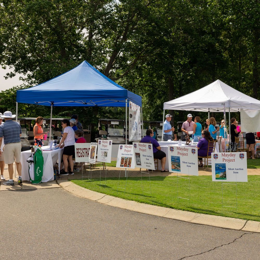 People Gathered Under a Blue Tent — Lake Wylie, SC — Mayday Project