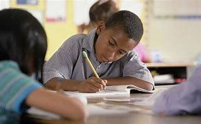 Kid Writing on His Notebook — Lake Wylie, SC — Mayday Project