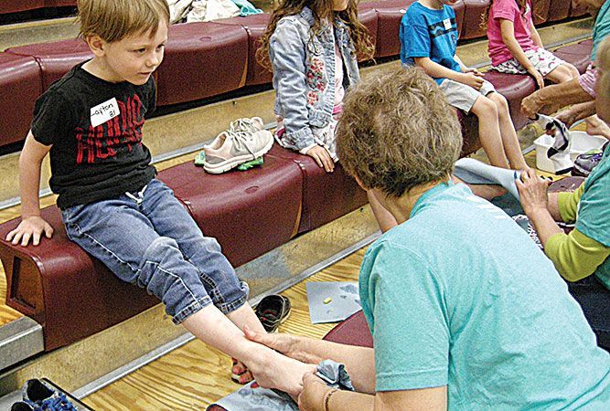 Kids Getting Their New Shoes — Lake Wylie, SC — Mayday Project