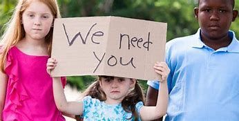 Kid Holding Sign with We Need You Written on it — Lake Wylie, SC — Mayday Project