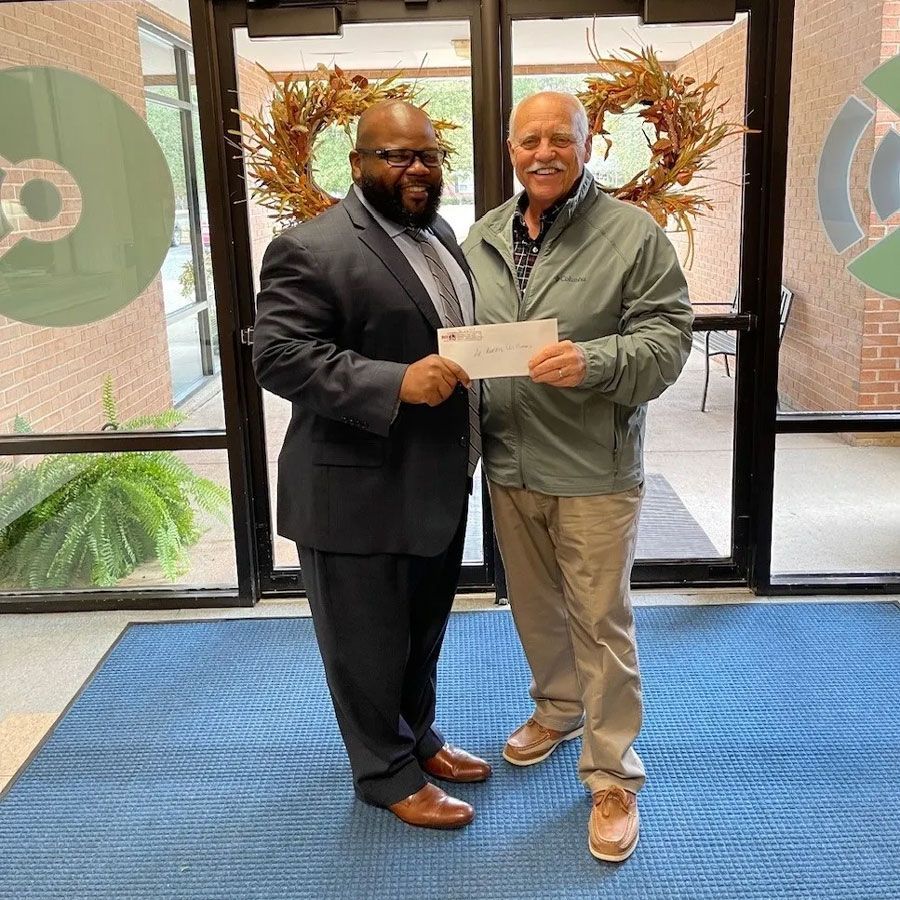 Men Holding a Check — Lake Wylie, SC — Mayday Project