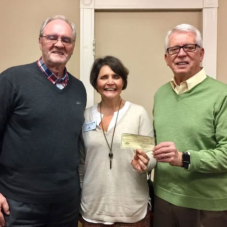 Elderly People Holding a Check — Lake Wylie, SC — Mayday Project