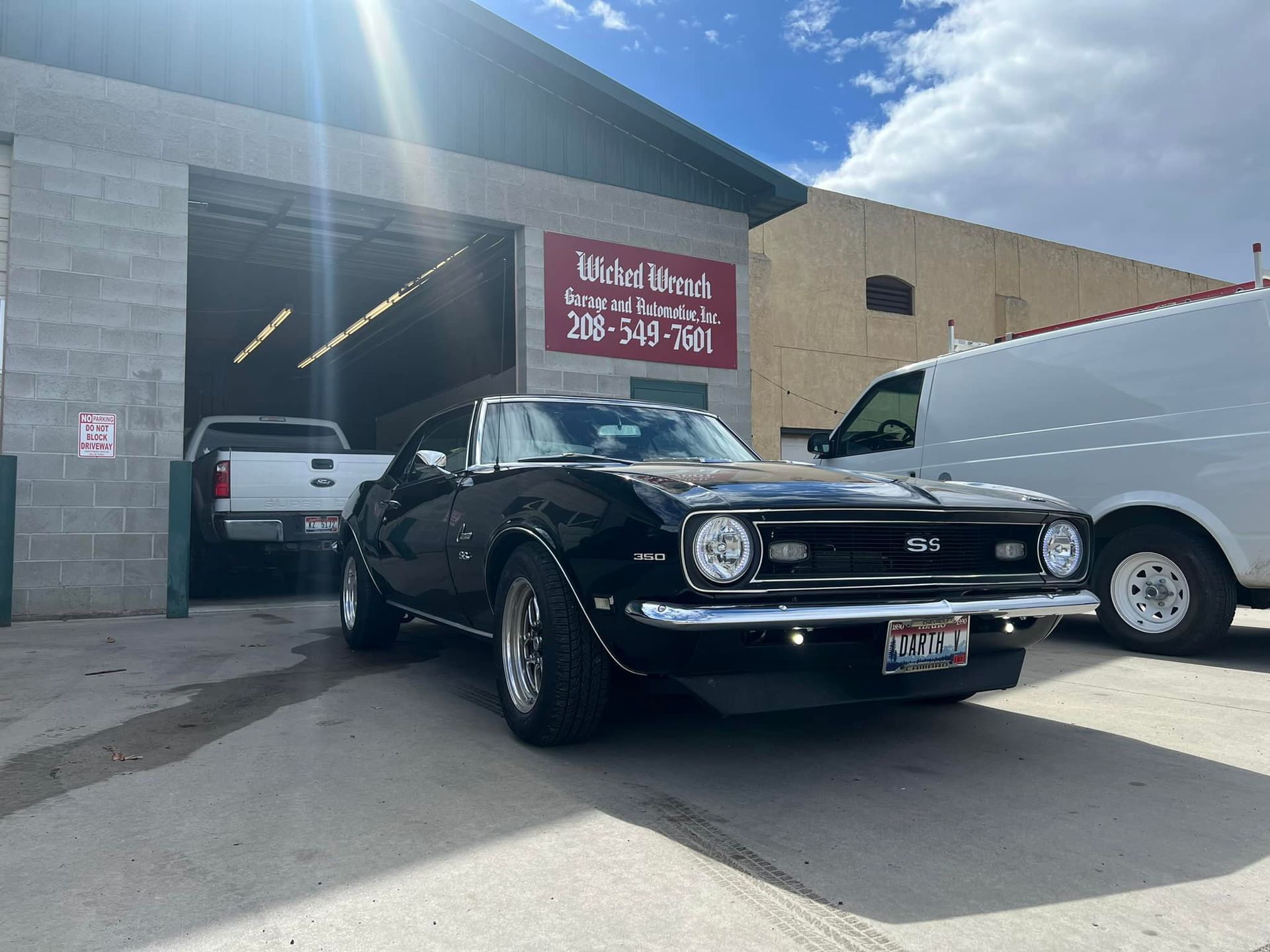Black classic car parked in front of the shop | Wicked Wrench Garage and Automotive