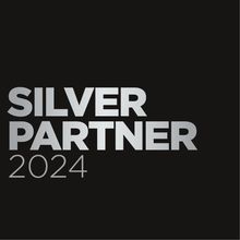 A silver partner 2024 logo on a black background